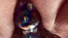 up close curvy hairy pussy takes glass dildo deep