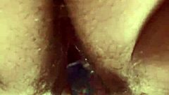 up close curvy hairy pussy takes glass dildo deep