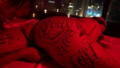 alternative girl tries wax play with big guy