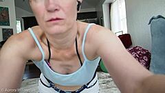 aurora flexes deeply in snug booty shorts workout session