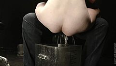bound and filled with bucketfulls in intense bondage session