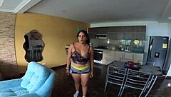 Seductive neighbor dances teasingly in apartment close-up