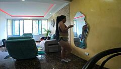 Seductive neighbor dances teasingly in apartment close-up