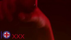 Nurse greene kneels at gloryhole sucking stranger's throbbing cock hungrily