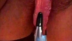 watch these huge pink pussy lips stretch and dangle with weights