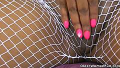 British black milf fingers her wet pink pussy hard