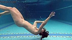 Hungarian brunette babe teases big tits and ass in naked pool shower swim