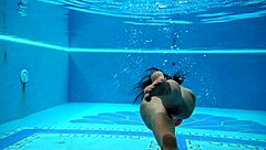 Hungarian brunette babe teases big tits and ass in naked pool shower swim