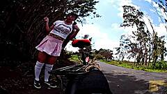 Miniskirted biker flashes panties before outdoor cumshot