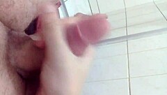 Watch her stroke my cock before the shower!