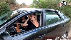 Two german amateur teens kissing in the car outdoors