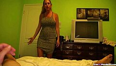 Horny milf strokes massive cock of young stud