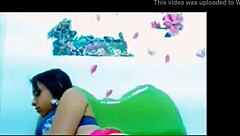 She shares her shaved pussy on webcam while stroking a cock.