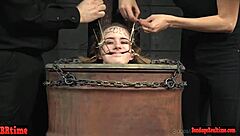 Submissive Slave Endures Bondage Torment from Maledom and Femdom Partners in Rough BDSM Session