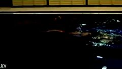 blonde girl in bikini enjoys a hassle-free night outdoors