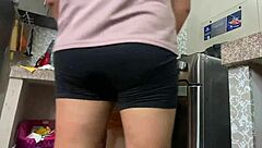 She feels intense pleasure as he licks her ass while she cooks in the kitchen.