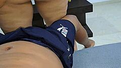 This mature woman undresses while cleaning the room, admiring her figure