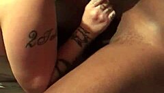 She eagerly sucks his massive black cock, her big tits bouncing as she takes it deep into her mouth.