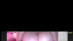 watching big juicy tits bounce on webcam, teasing with every move, inviting closer look at those boobs