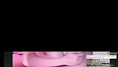 watching big juicy tits bounce on webcam, teasing with every move, inviting closer look at those boobs