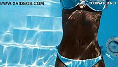 beautiful hungarian candee licious swims naked underwater with petite blonde tits and ass on display