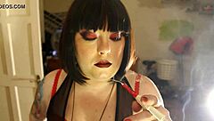 Fat Domme Tina Smua Smokes Filterless Cigarette In Holder