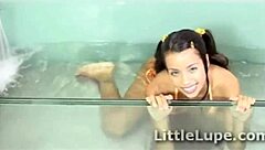 Lupe pleasures her tight shaved pussy