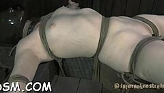 Tied up hotty waits in fear for her next hardcore blowjob!