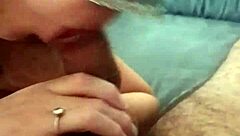 couple engages in handjob and blowjob, leading to cum on cock