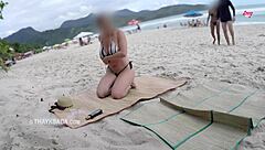 Hot wife asks beach vendor to rub sunscreen on her tanned skin. This African milf amateur heats up the shore.