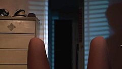 A nude blonde girl celebrates Halloween in bed.