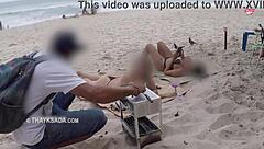 Hot wife asks beach vendor to rub sunscreen on her tanned skin. This African milf amateur heats up the shore.