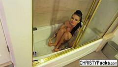 Christy Mack's sexy bath contrasts with her tattooed body