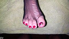 creamy feet in stockings with toes on display