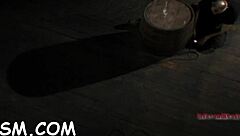 brunette slave explores huge fake penis with toys in bdsm masturbation session