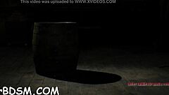 brunette slave explores huge fake penis with toys in bdsm masturbation session