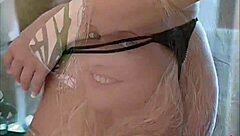 Michelle Marsh, the busty model with big tits, poses as the sexiest woman alive.