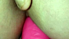 Girl rides large dildo on her pussy