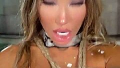 monika fox lounges by the pool, covered in wax, trying out a new buttplug