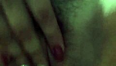 Amateur girl shows her wet, hairy pussy during homemade masturbation.