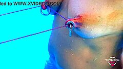 nippleringlover stretches pierced nipples bound in pool