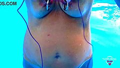 nippleringlover stretches pierced nipples bound in pool