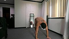 Wednesday stretches naked in yoga