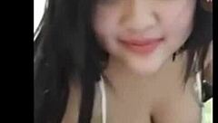 Gigantic Asian Boobs Bounce During Striptease