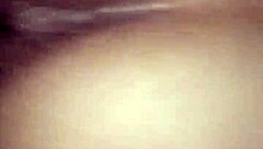 the young woman savors a delicious blowjob in the bedroom, her lips wrapped tightly around the throbbing cock as she takes it deep, moaning softly with each thrust from behind.