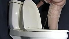 i found a strange method to use the bathroom in fishnets