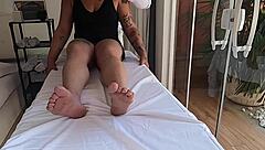 Married woman touched by therapist during tantric massage
