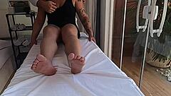 Married woman touched by therapist during tantric massage