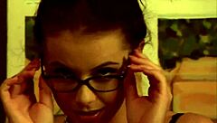 Penny Flame Strips Naked And Fingers Herself