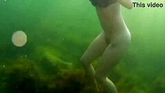 crazy diver caught me on cam while i was swimming and flashing my hairy pussy in the sea!